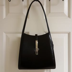Patent leather shoulder bag with crossbody inside